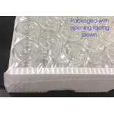 ISO 2R vial packaged inverted - the opening is facing down in a shrink wrapped plastic tray